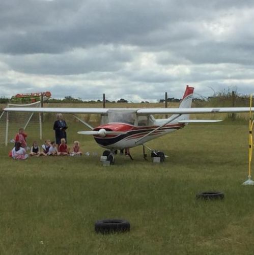 A plane on the school field!